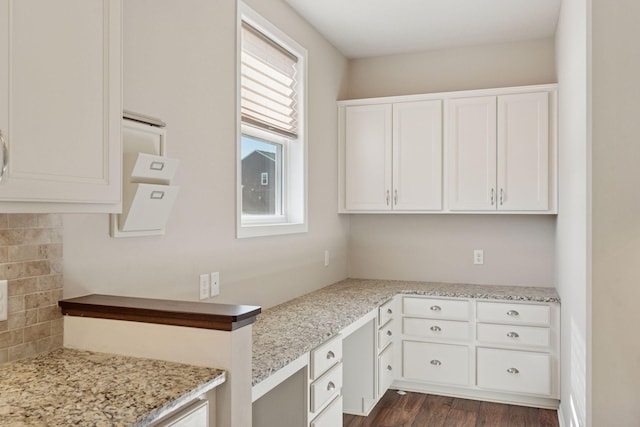 laundry room featuring dark wood finished floors