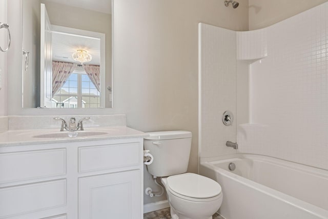 bathroom featuring bathing tub / shower combination, toilet, and vanity