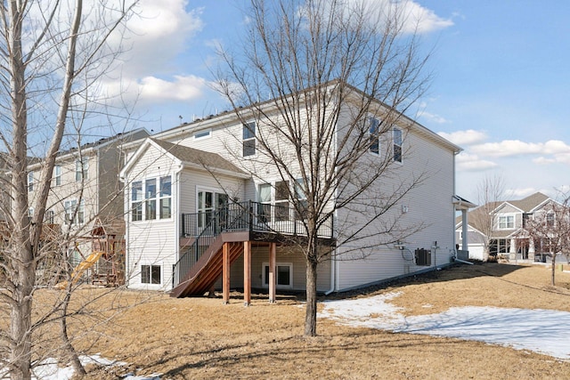 rear view of property with stairs, a deck, and cooling unit