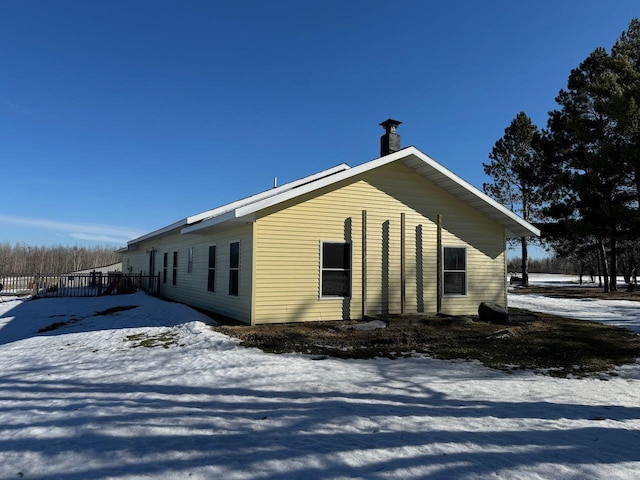 view of snow covered property