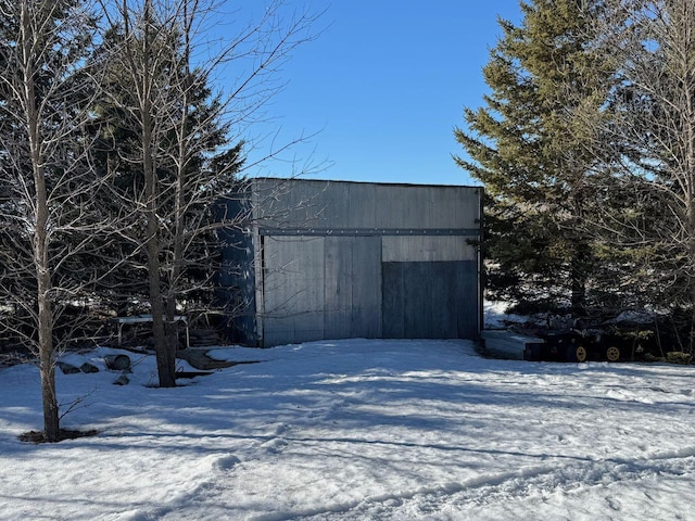 view of snow covered garage