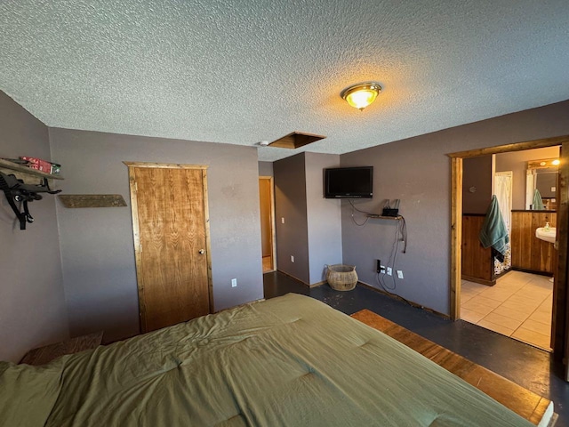 unfurnished bedroom with a textured ceiling