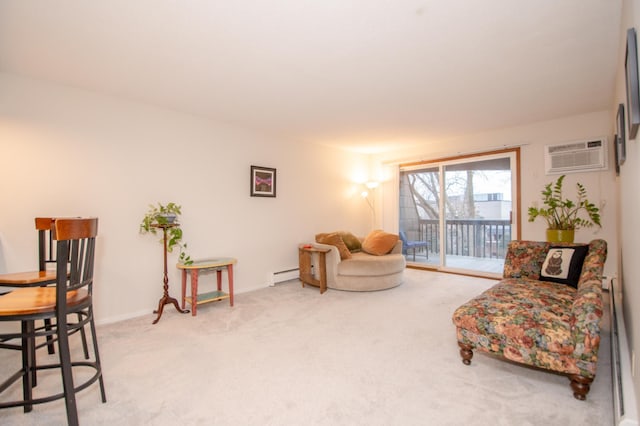 sitting room featuring baseboard heating, a wall mounted AC, and light colored carpet