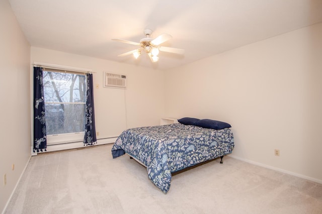 bedroom featuring a baseboard heating unit, carpet, a wall mounted air conditioner, and baseboards