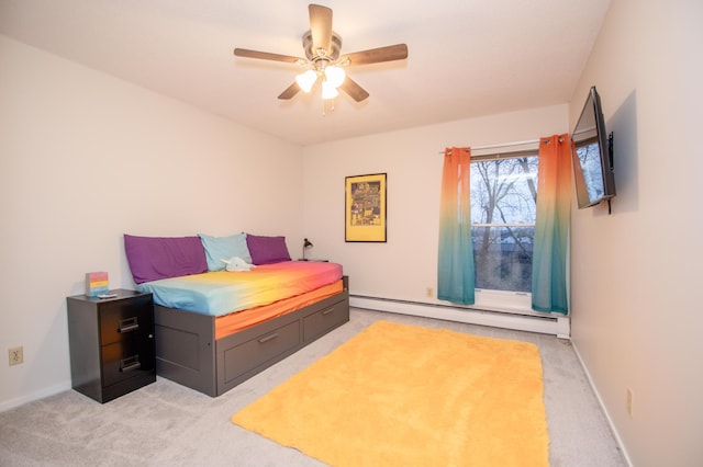 bedroom featuring a ceiling fan, a baseboard radiator, light carpet, and baseboards