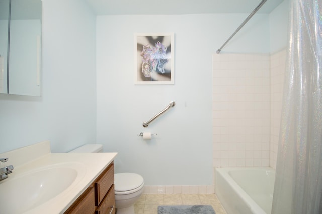 bathroom with baseboards, toilet, tile patterned floors, shower / bathtub combination with curtain, and vanity