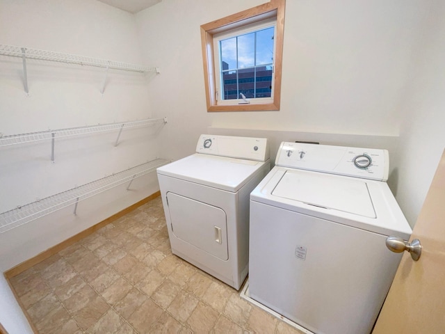 laundry room featuring laundry area and washer and clothes dryer