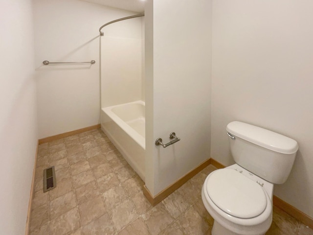 full bath with toilet, visible vents, baseboards, and bathing tub / shower combination