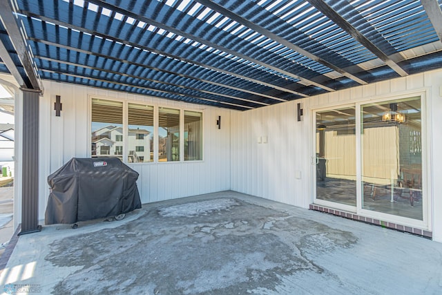 view of patio / terrace with a grill and a pergola