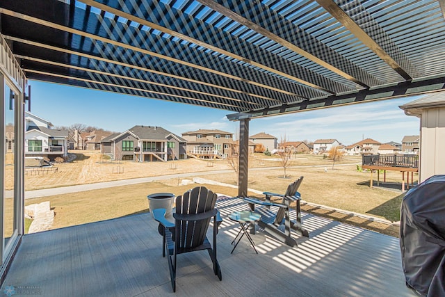 view of patio with a pergola, a residential view, and a grill