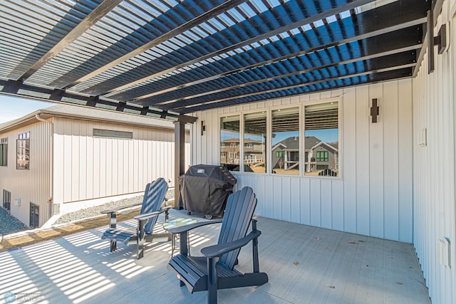 view of patio / terrace featuring a pergola and a grill