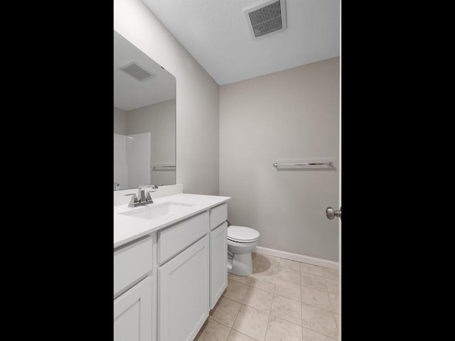 bathroom featuring toilet, tile patterned flooring, visible vents, and vanity