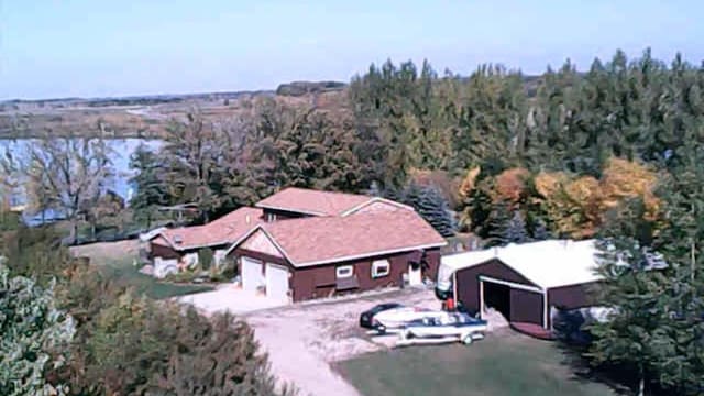 bird's eye view with a view of trees