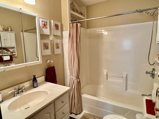 bathroom with shower / bath combo and vanity