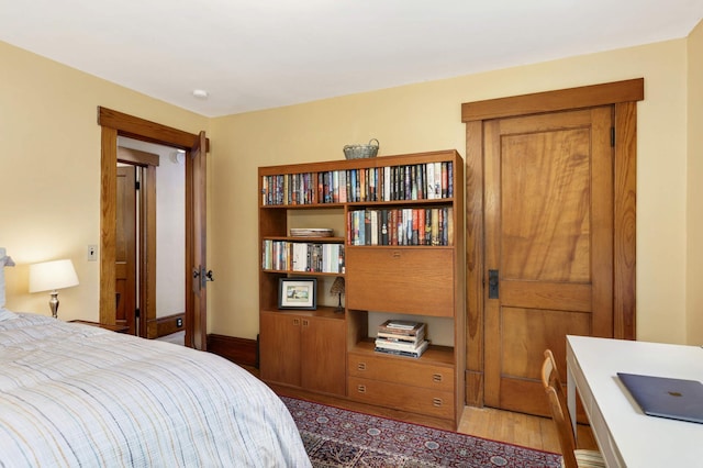 bedroom featuring wood finished floors