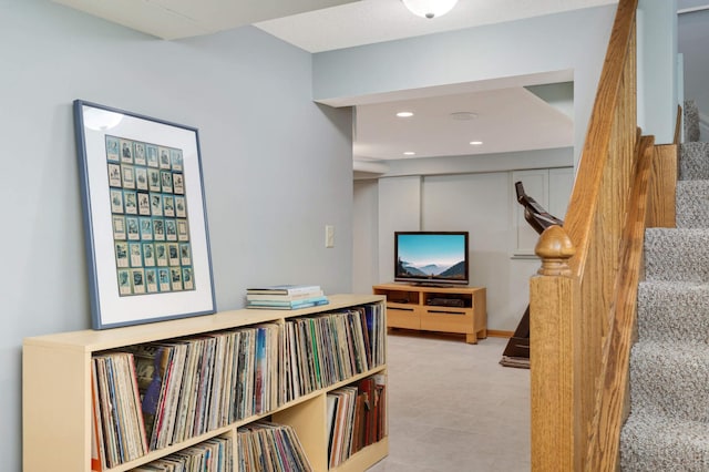 interior space featuring recessed lighting and stairs