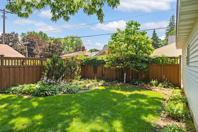 view of yard featuring fence