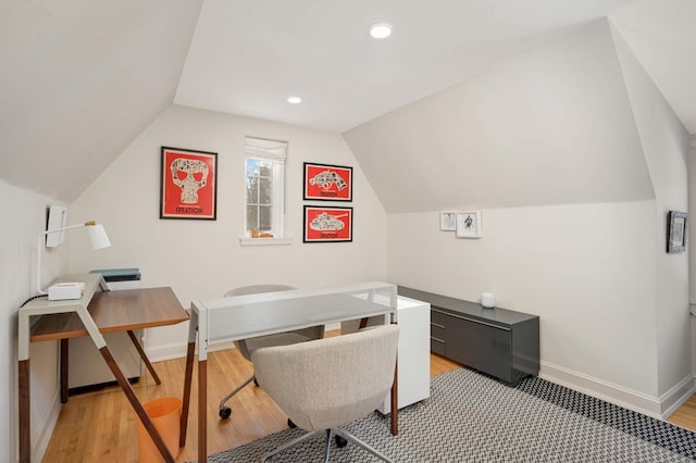 office space featuring lofted ceiling, light wood finished floors, recessed lighting, and baseboards