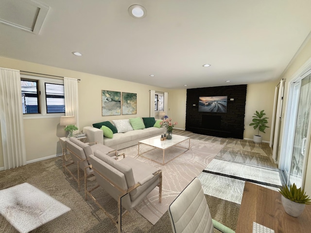 carpeted living area with baseboards, a wealth of natural light, and recessed lighting