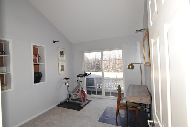 workout room with high vaulted ceiling and carpet flooring