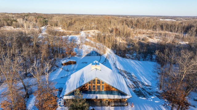 bird's eye view featuring a wooded view