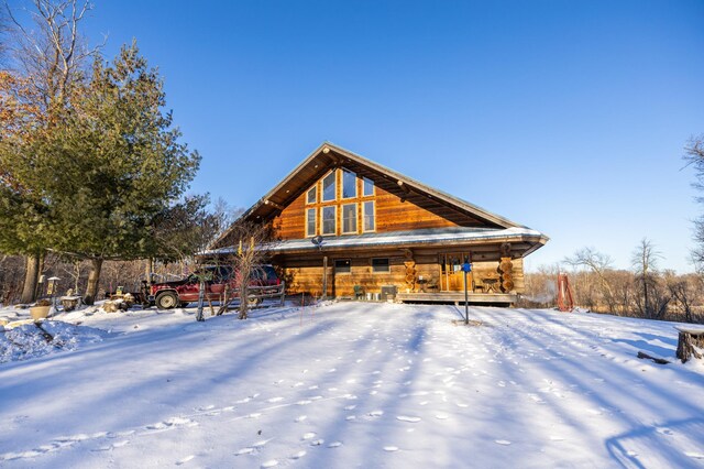 view of snow covered property