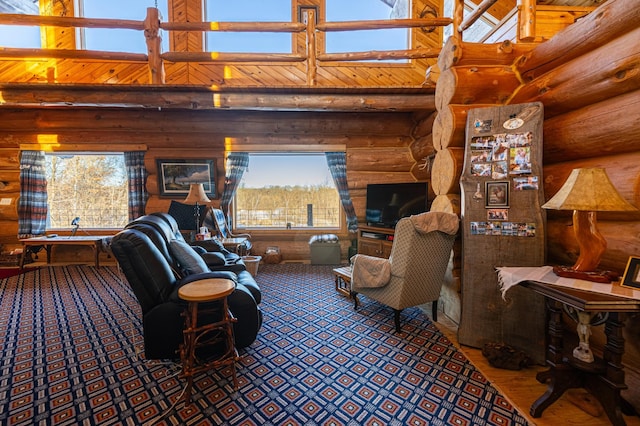 living area with rustic walls and a towering ceiling