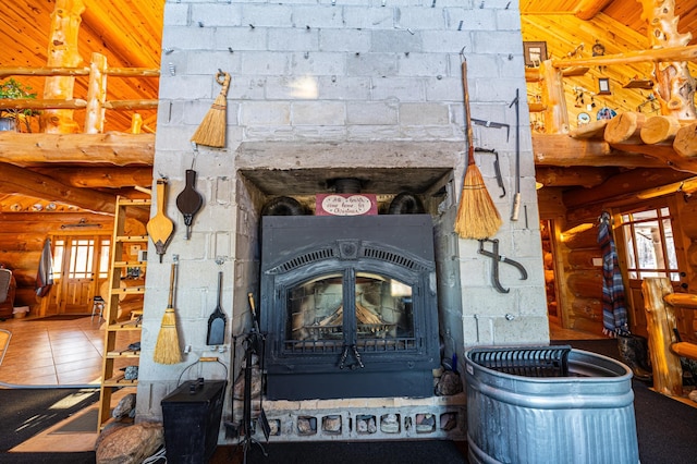 details with a wood stove and log walls