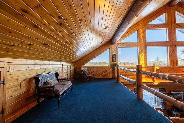 sitting room with lofted ceiling with beams, wood walls, wood ceiling, and carpet flooring