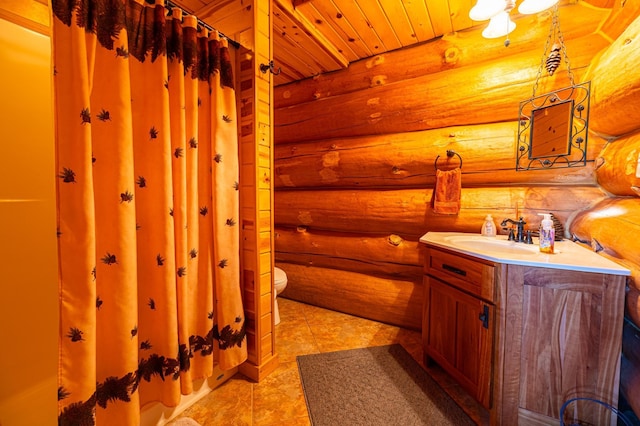 17910 27th Ave, Fair Haven Twp, MN 55320 - full bath featuring vanity, log walls, toilet, tile patterned flooring, and a shower with curtain