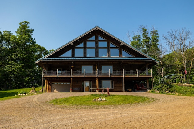 17910 27th Ave, Fair Haven Twp, MN 55320 - log home featuring driveway, a garage, and a deck