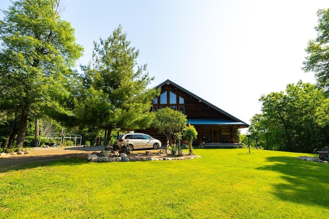 17910 27th Ave, Fair Haven Twp, MN 55320 - view of grassy yard featuring covered porch and driveway