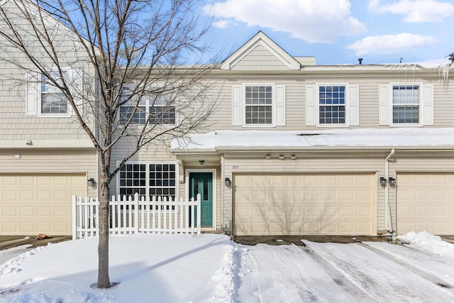 view of property featuring an attached garage