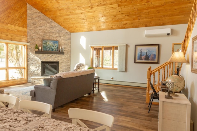 living area with a wall mounted AC, healthy amount of natural light, vaulted ceiling, wooden ceiling, and a baseboard heating unit