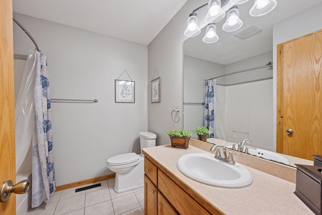 bathroom featuring visible vents, toilet, a shower with shower curtain, tile patterned floors, and vanity