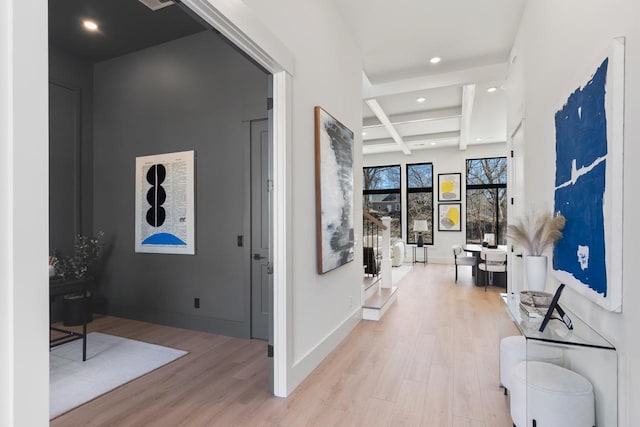 hallway featuring recessed lighting, wood finished floors, coffered ceiling, beamed ceiling, and baseboards