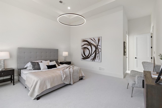 carpeted bedroom featuring recessed lighting, visible vents, and baseboards