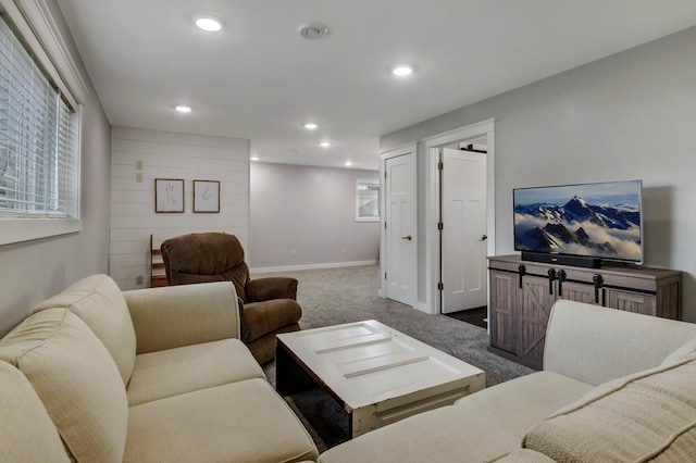 living area with baseboards, carpet flooring, and recessed lighting