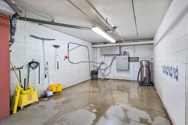 garage with concrete block wall