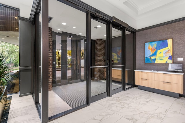 wine cellar with recessed lighting, marble finish floor, and crown molding