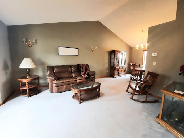 living room with lofted ceiling, an inviting chandelier, and carpet