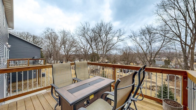 deck with outdoor dining area