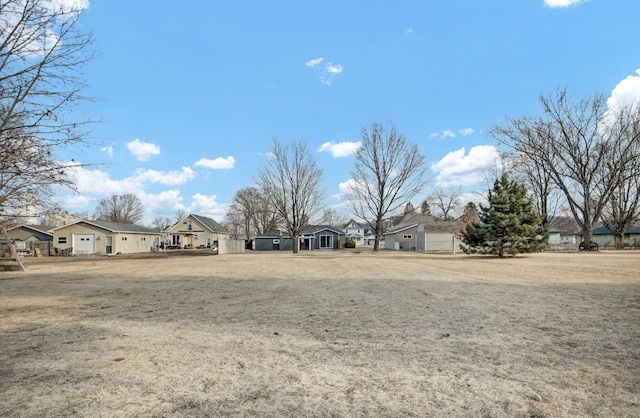 view of yard featuring a residential view