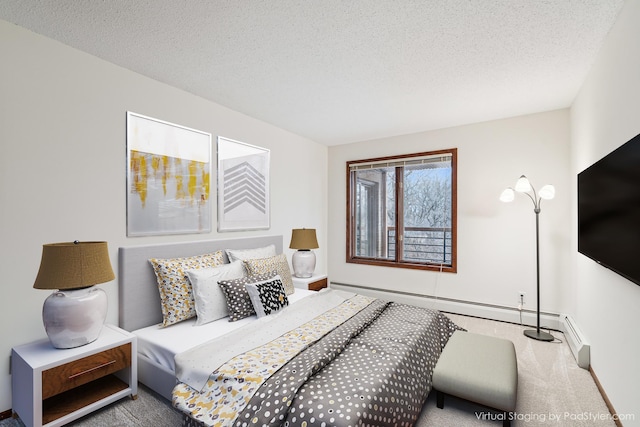 carpeted bedroom with a textured ceiling, a baseboard heating unit, and baseboards