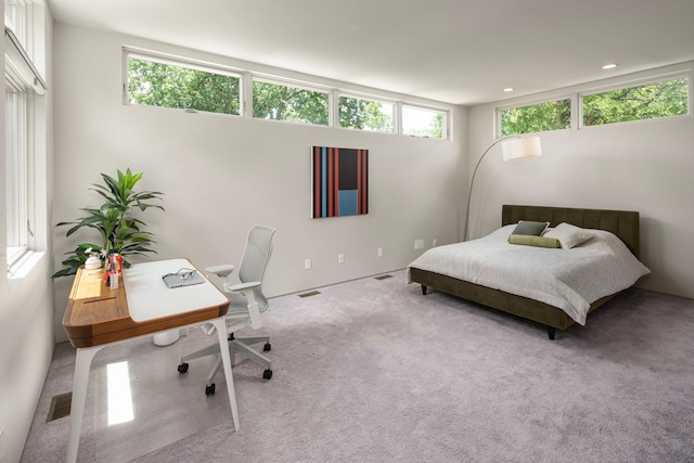 bedroom featuring carpet floors, visible vents, and recessed lighting