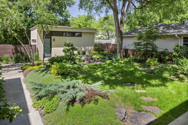 view of yard featuring fence