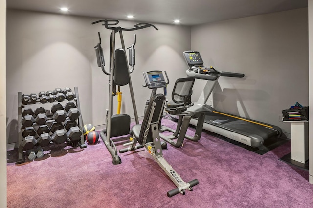 exercise area with carpet floors and recessed lighting