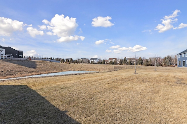 view of yard with a water view