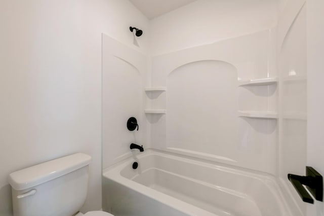 full bathroom featuring toilet and  shower combination