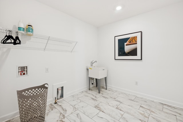 laundry area featuring laundry area, baseboards, marble finish floor, washer hookup, and recessed lighting